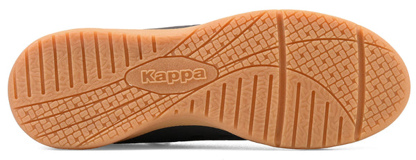 Imagem de sola da chuteira grafite Kappa, com detalhes na sola antiderrapante e marca visível no centro, apresentando um design em relevo para melhor aderência.